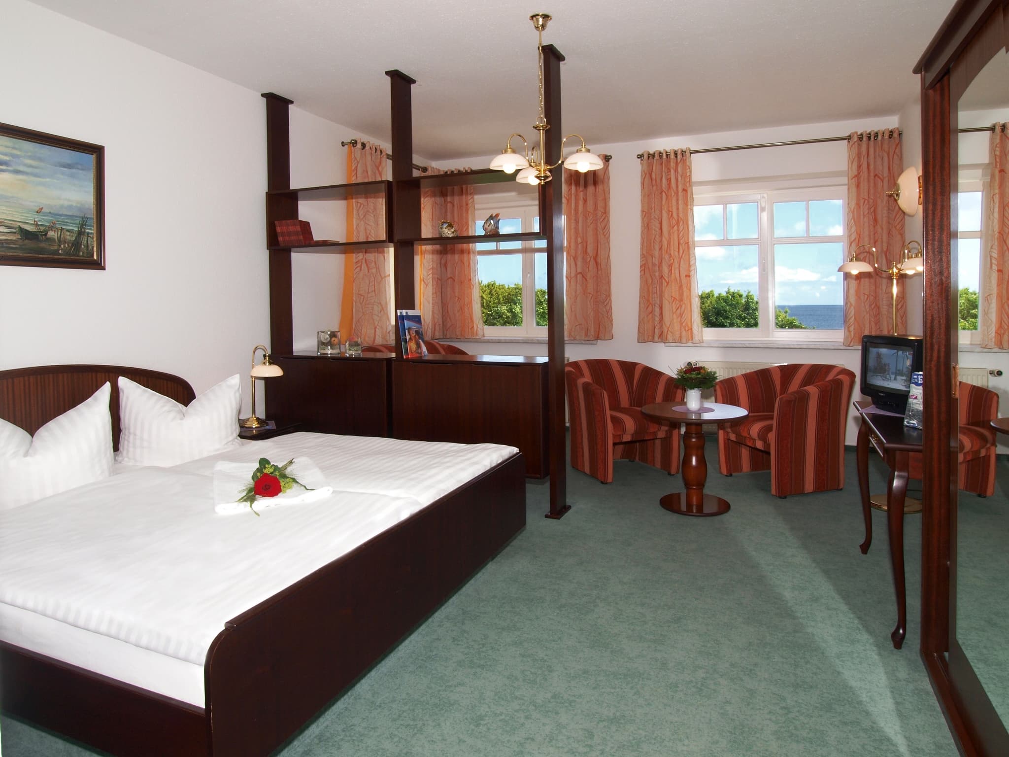 Suite mit Doppelbett und Sitzecke