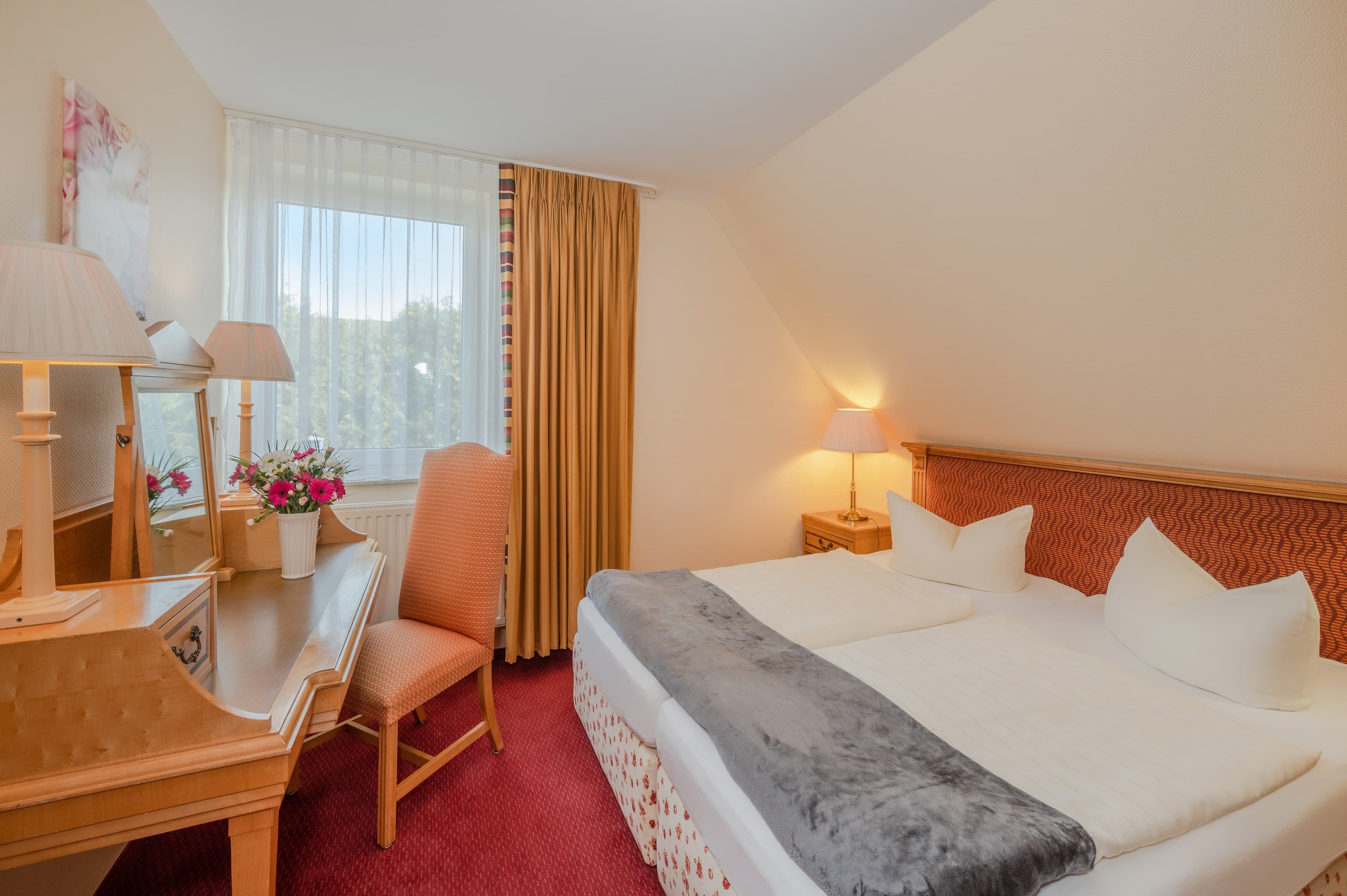 Schlafzimmer mit Doppelbett in Junior Suite