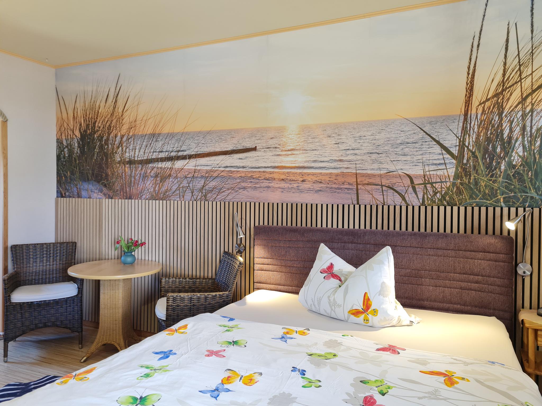 Schlafzimmmer mit Strand-Fototapete