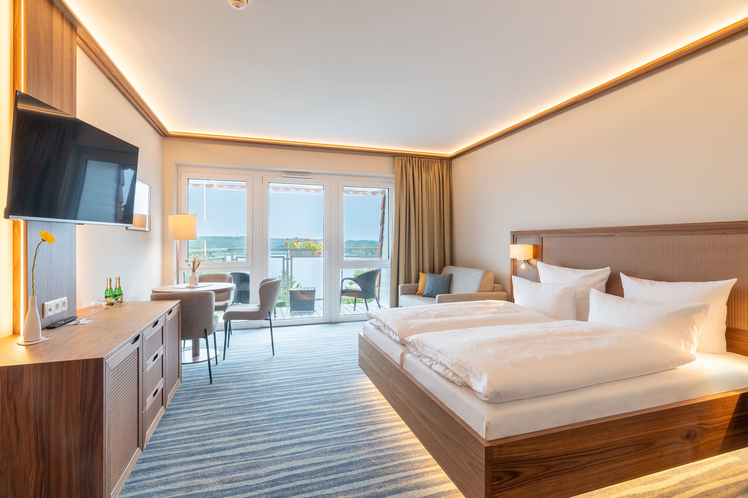 Auf dem Bild ist die Innenansicht eines Doppelzimmer deluxe im Strandhotel Seerose zu sehen.